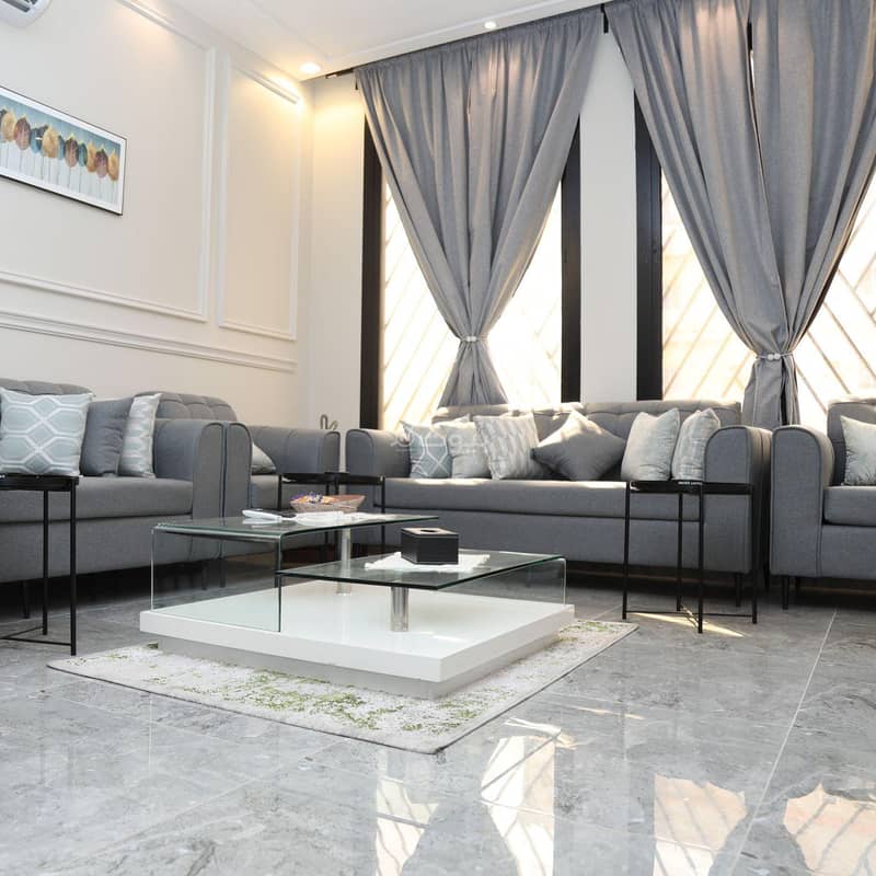 apartment. An elegant bedroom and living room apartment. An elegant bedroom and living room