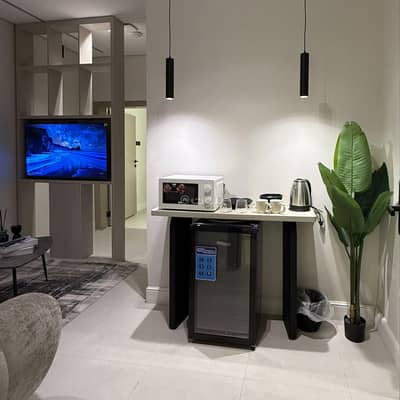 1 Bedroom Apartment for Rent in Riyadh - Elegant apartment with a living room and a bedroom