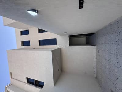 5 Bedroom Floor for Sale in West Riyadh, Riyadh - The apartment includes a car entrance, a men's sitting room with washing areas, a dining room, a living room, a kitchen, and three bedrooms, one of which has an en-suite. The apartment consists of a men's sitting room with washing areas, a living room, a kitchen, two bedrooms, and a spacious roof.
