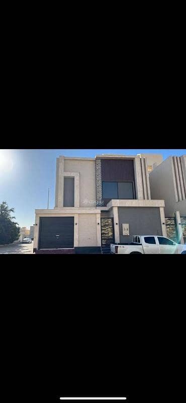 6 Bedroom Villa for Sale in South Riyadh, Riyadh - A two-story detached villa with a staircase, living room, and a separate apartment for sale in Badr