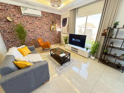 1 Bedroom Flat for Rent in Central Jeddah, Jeddah - A one-bedroom apartment with a living room and an ideal outdoor seating area for relaxation | Jeddah | Al-Faisaliah neighborhood