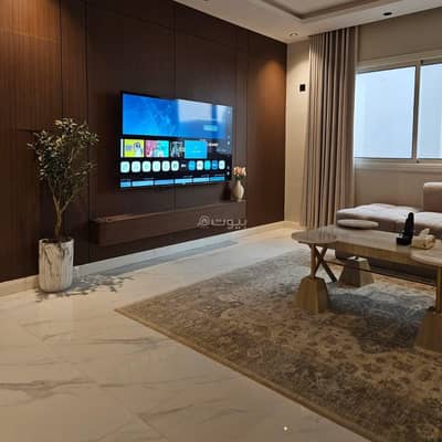 3 Bedroom Flat for Rent in North Riyadh, Riyadh - Three-bedroom apartment with a living room with a 70-inch screen