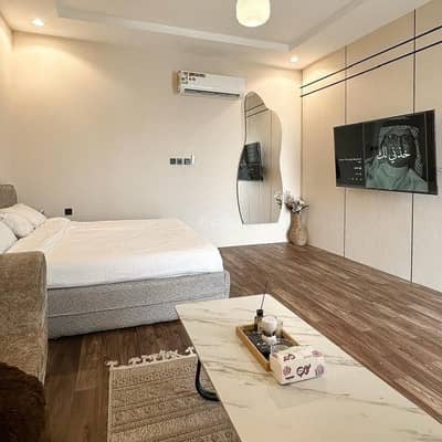 1 Bedroom Flat for Rent in Abha - Quiet studio with master bed and side seating