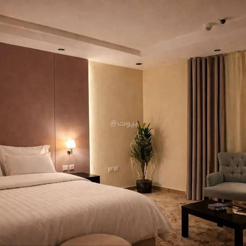 Studio with master bed and side seating Studio with master bed and side seating