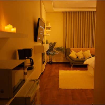 1 Bedroom Flat for Rent in Suiz - Studio with a comfortable bed and a screen 1 Bedroom Flat for Rent in Suiz - Studio with a comfortable bed and a screen