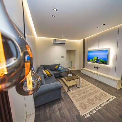 2 Bedroom Apartment for Rent in Badr, Al Harajah Aseer Region - Two-bedroom apartment and a living room