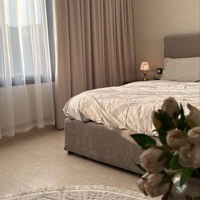 1 Bedroom Flat for Rent in Al Hamra, Al Khobar - Studio with master bed and side seating