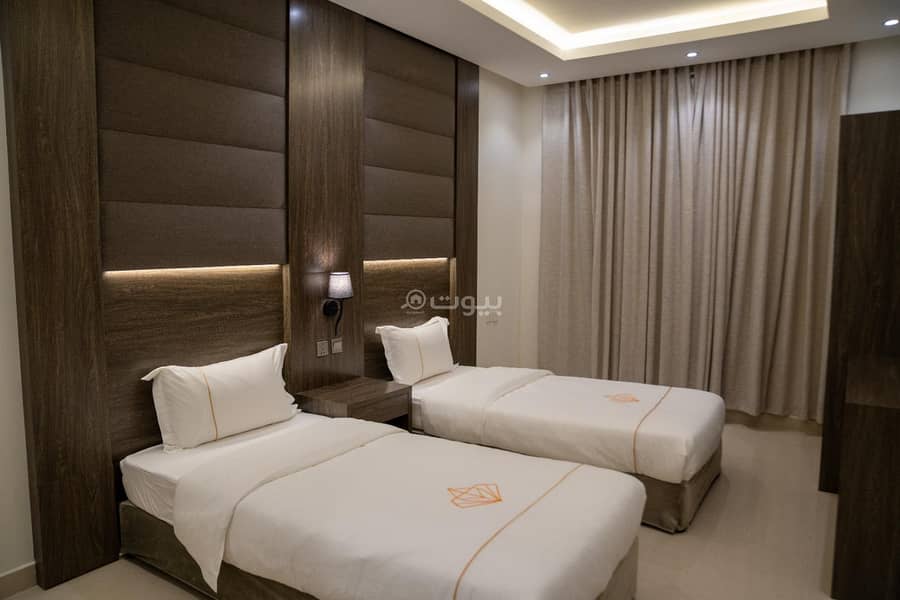 Two-bedroom suite with a living room and two bathrooms. Unit#1 Two-bedroom suite with a living room and two bathrooms. Unit#1