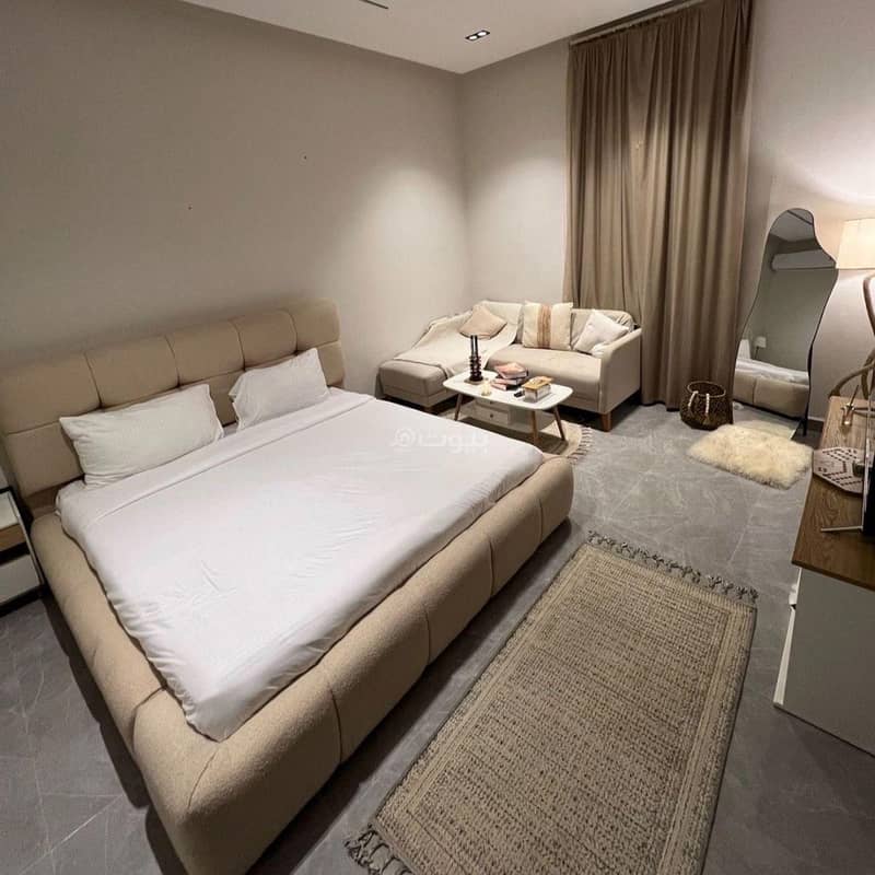 Studio with master bed and side seating Studio with master bed and side seating
