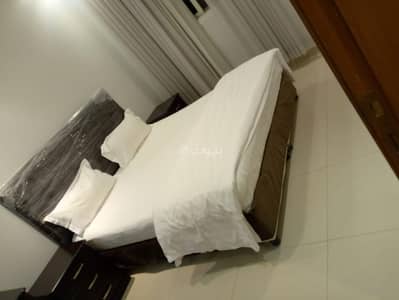 1 Bedroom Flat for Rent in East Riyadh, Riyadh - A bedroom, a living room, and a kitchen unit-10