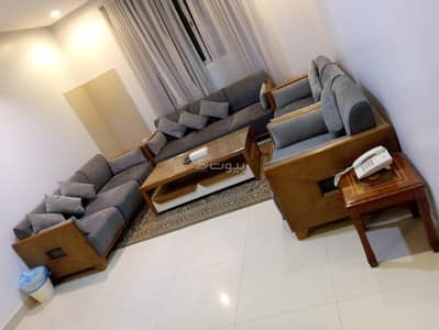 1 Bedroom Apartment for Rent in East Riyadh, Riyadh - A bedroom, a living room, and a kitchen unit-13