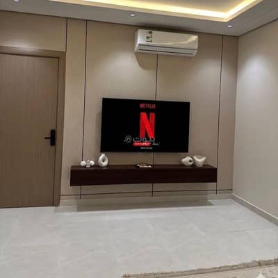 1 Bedroom Apartment for Rent in Qurtubah, Buraydah Al Qassim Region - A hotel bedroom and lounge
