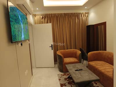 1 Bedroom Apartment for Rent in North Riyadh, Riyadh - Living room and hall with a bathroom