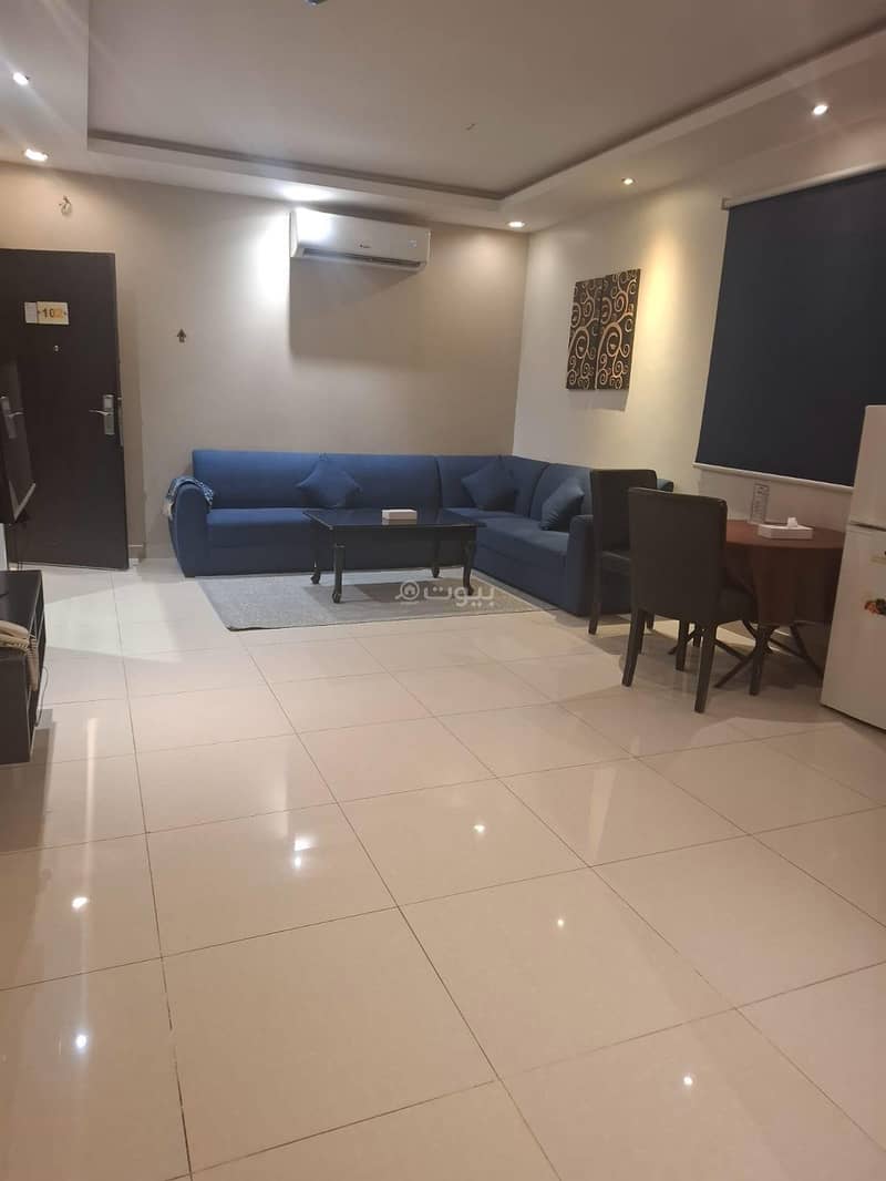 A bedroom and a living room with a bathroom and a preparatory kitchen Unit 22 A bedroom and a living room with a bathroom and a preparatory kitchen Unit 22