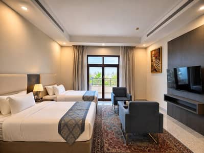 2 Bedroom Apartment for Rent in Tabuk - A luxurious family suite with two bedrooms and a living room