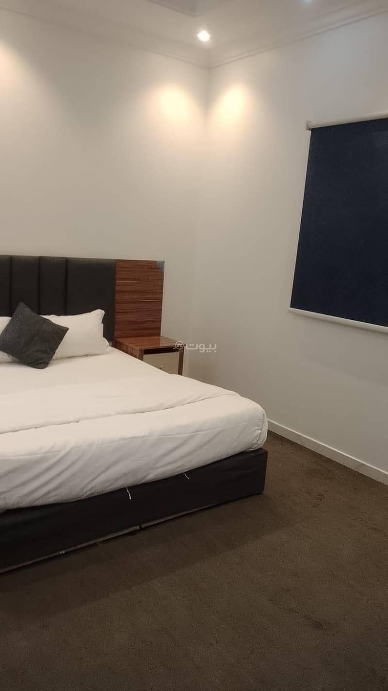 Two bedrooms and a living room with a bathroom and a kitchen Two bedrooms and a living room with a bathroom and a kitchen