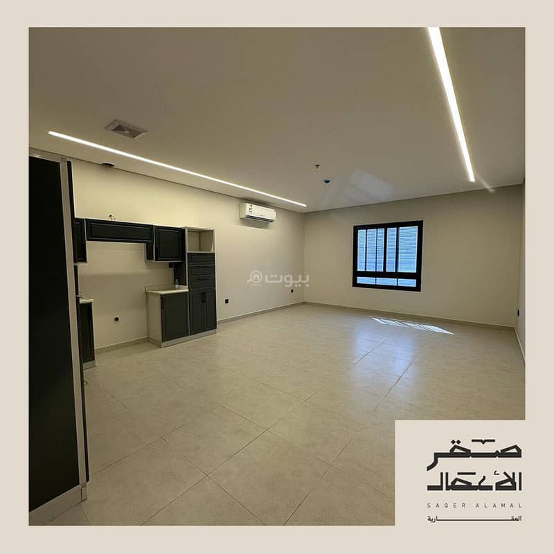 A three-bedroom apartment with a living room and a private bathroom. A three-bedroom apartment with a living room and a private bathroom.