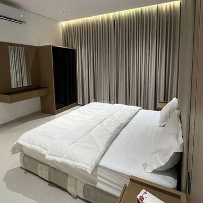 1 Bedroom Apartment for Rent in Al Khuzama, Hail - Luxurious bedroom and lounge