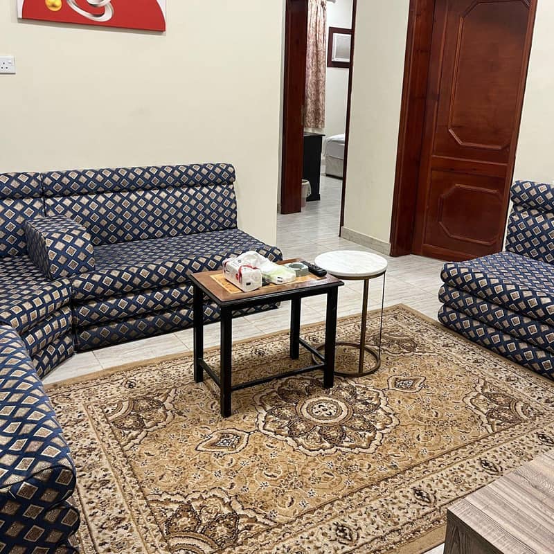 Two-bedroom apartment and a living room Two-bedroom apartment and a living room