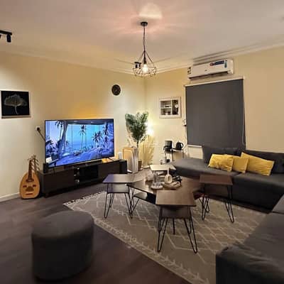 1 Bedroom Flat for Rent in Historical Center Al Mubarraz, Al Ahsa - Apartment with a living room and a bedroom 1 Bedroom Flat for Rent in Historical Center Al Mubarraz, Al Ahsa - Apartment with a living room and a bedroom