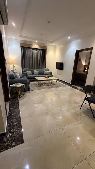 1 Bedroom Apartment for Rent in North Jeddah, Jeddah - A suite consisting of a bedroom, a living room, and a bathroom Unit-10