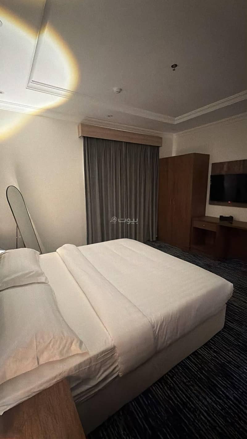 A suite consisting of a bedroom, a living room, and a bathroom Unit-4 A suite consisting of a bedroom, a living room, and a bathroom Unit-4