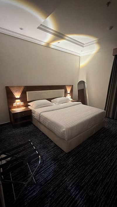 1 Bedroom Flat for Rent in North Jeddah, Jeddah - A suite consisting of a bedroom, a living room, and a bathroom Unit-1