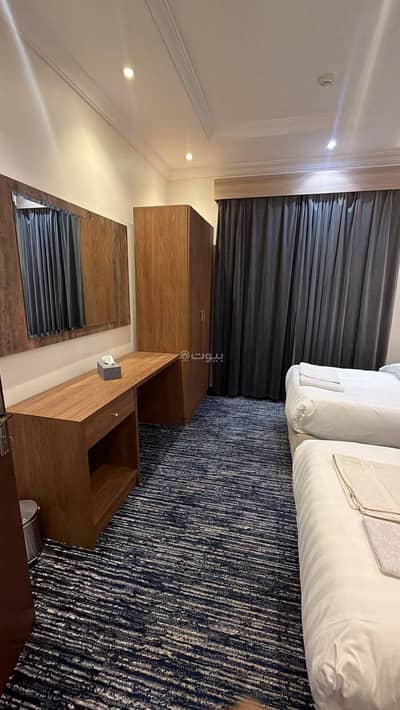 1 Bedroom Flat for Rent in North Jeddah, Jeddah - A suite consisting of a bedroom, a living room, and a bathroom Unit-8
