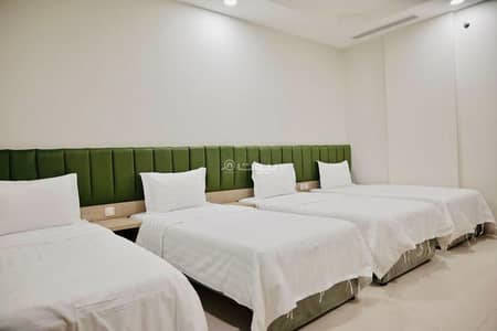 2 Bedroom Apartment for Rent in Al Aziziyah, Makkah - Two-bedroom apartment with a living room and a fully equipped kitchen, unit number 9