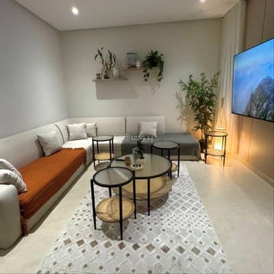 1 Bedroom Flat for Rent in Al Rakah Al Shamaliyah, Dammam - A living room and a bedroom with a balcony with smart entry