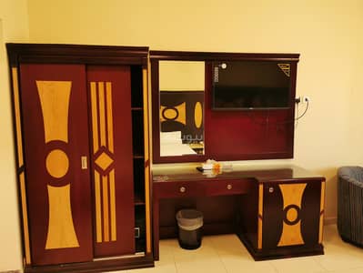 1 Bedroom Apartment for Rent in Al Aziziyah, Makkah - A room with a double bed - Unit 13